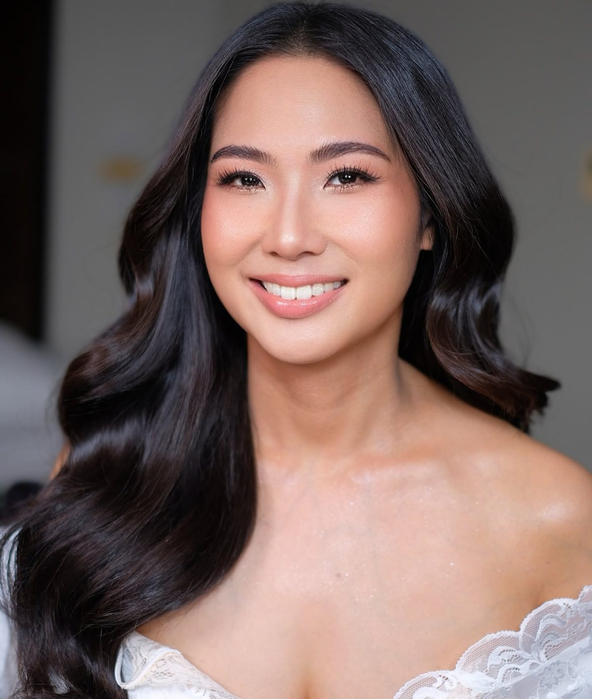 Bride with long, glossy curls